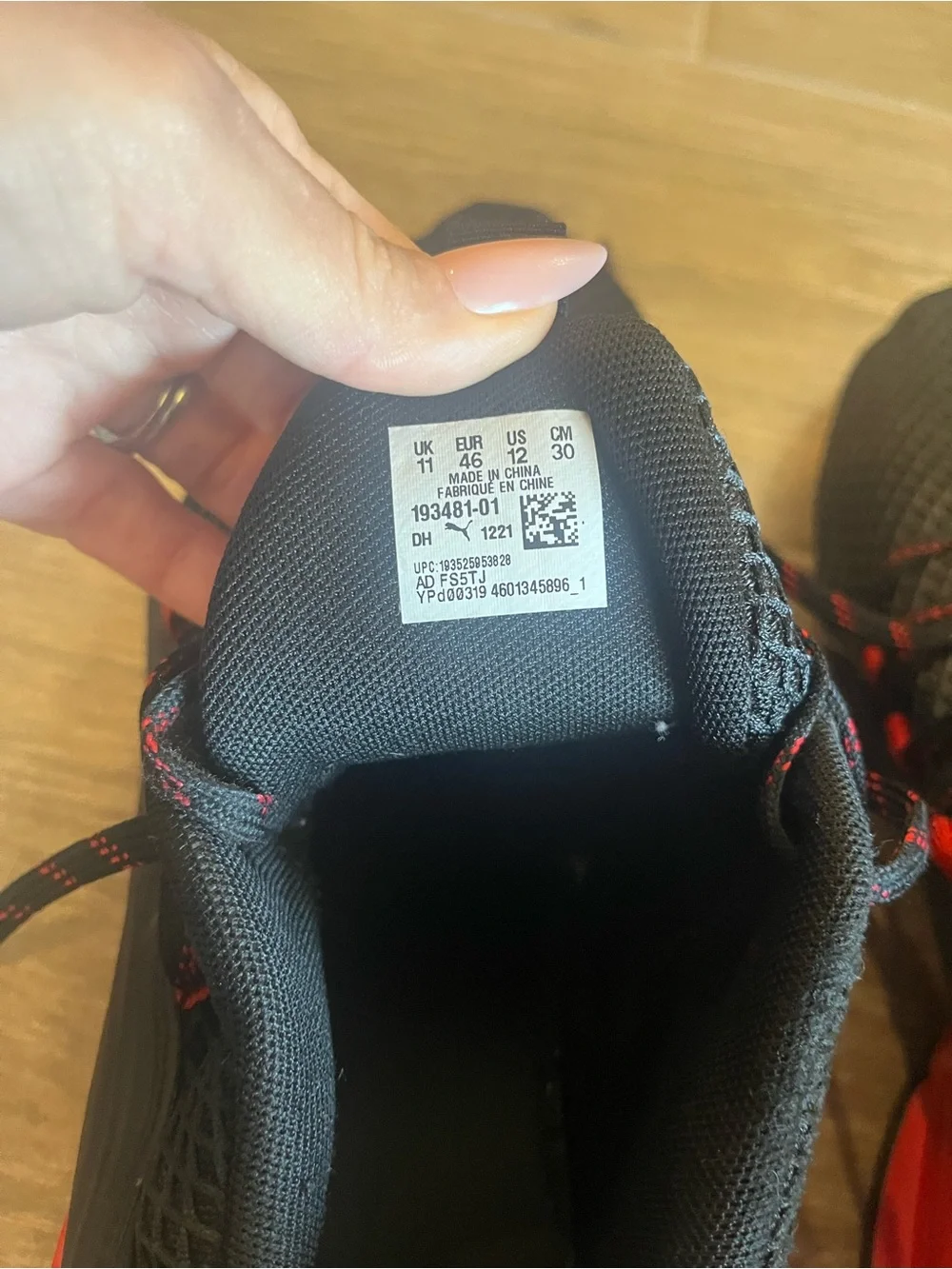 Puma Black Sneakers with Red Accent Logos